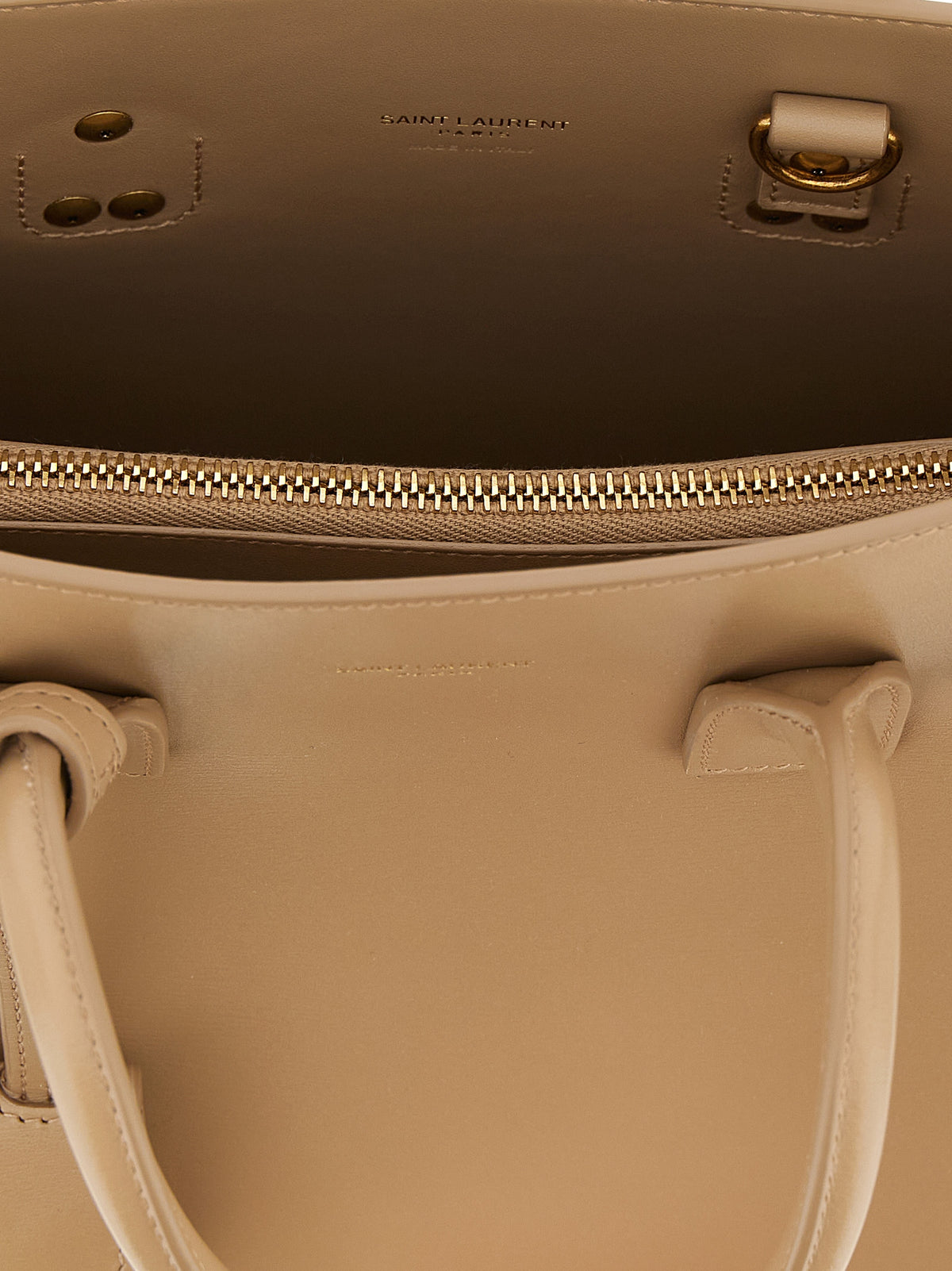 Saint Laurent handväska i beige kalvskinn